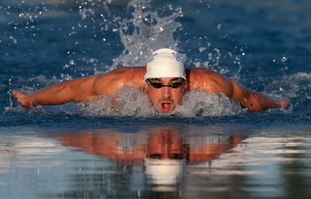 Phelps bo nosil ameriško zastavo na OI